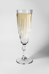 Beautiful glass of champagne on white background