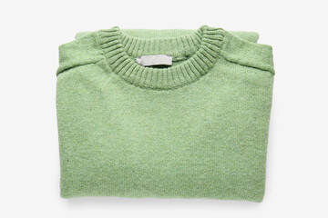Green male sweater on white background