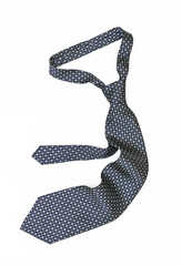 Blue silk tie isolated on white background