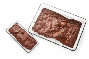 Baking dishes with tasty chocolate brownie isolated on white background