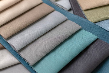 Samples of fabrics in different tones. The choice of fabrics for interior decoration. Palette