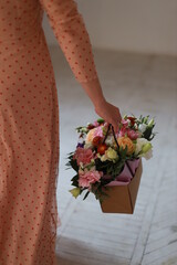 a bouquet of flowers in a basket