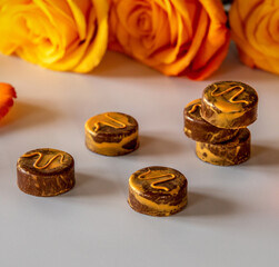 chocolate pralines and yellow rose
