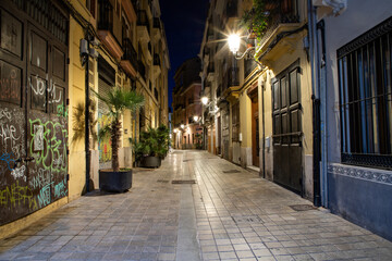 Fototapeta na wymiar quaint street view at night in Valencia Spain