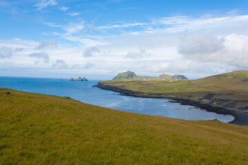 Vestmannaeyjar island beach day view, Iceland landscape.