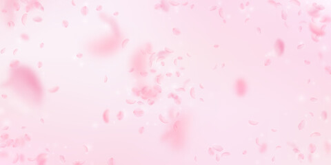 Fototapeta na wymiar Sakura petals falling down. Romantic pink flowers explosion. Flying petals on pink wide background. Love, romance concept. Lively wedding invitation.