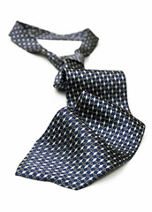 Blue silk tie isolated on white background