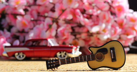 Guitar with Vintage Red Car and Cherry Blossoms, Shallow DOF