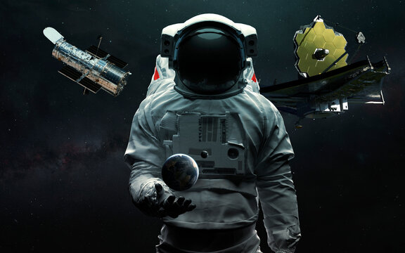 Astronaut and two telescopes James Webb and Hubble. JWST launch art. Elements of image provided by Nasa
