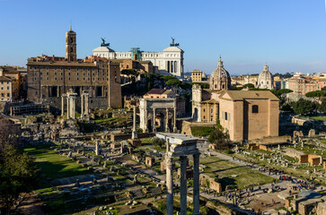 Obraz premium Blue sky above he ruines of the Roman Forum - the heart of the Romn Empire