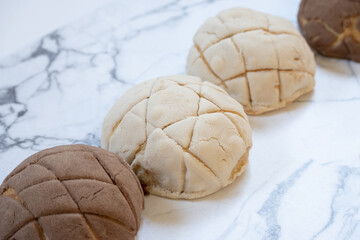 Homemade vanilla and chocolate Mexican conchas