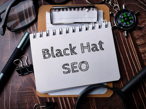 Notebook with Toolls and text Black Hat SEO.