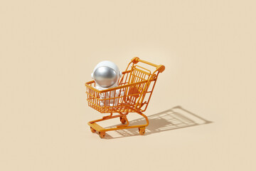 Toy cosmonaut inside shopping trolley