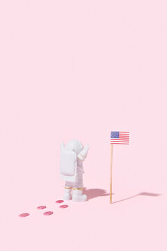 Cosmonaut placing american flag