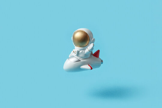 Astronaut in uniform flying on spaceship