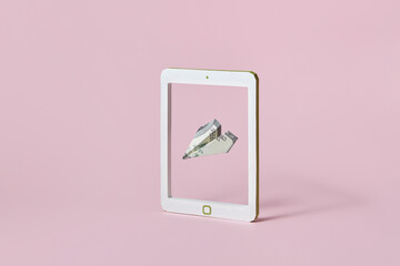 Dollar plane flying through smartphone frame