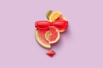 Funny face of fruits in red sunglasses