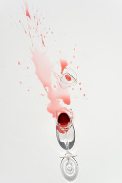 Wine splashed on table from goblet