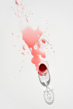 Wine splashed on table from goblet