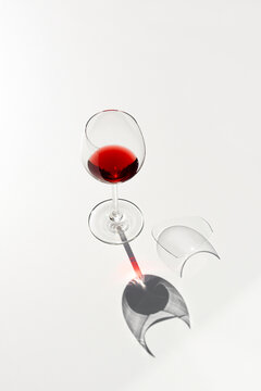 Broken wineglass with wine