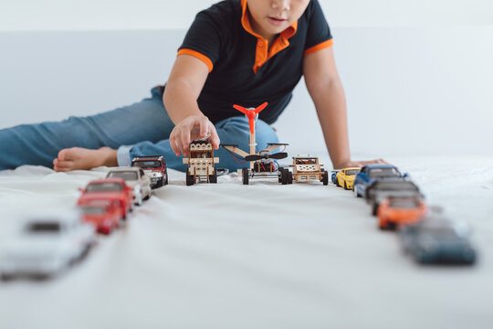 Car collection on carpet.