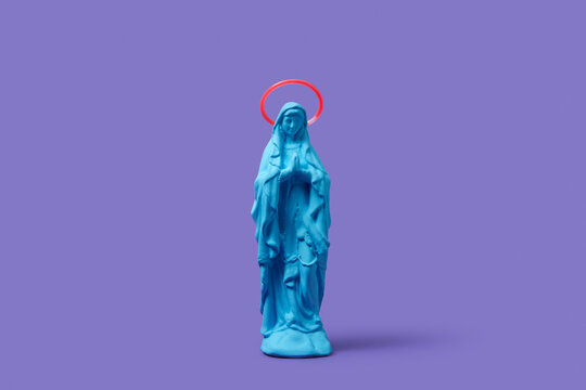 Praying Virgin Mary statue with halo