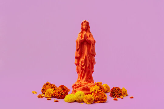 Orange Virgin Mary statue