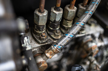 A close-up of a part of the tractor's engine