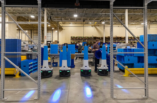 Lasers on front of robots at e-commerce warehouse
