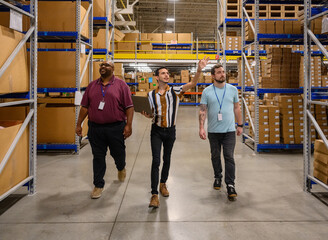 Manager leading meeting with employees at workplace 