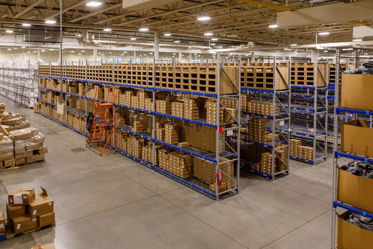 Organized Warehouse with worker at ecommerce center