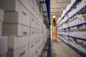 Digital Scanning white boxes in aisle at warehouse