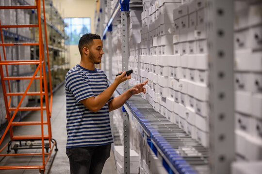 Scanning new  inventory at E-Commerce Warehouse 