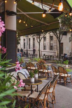Paris, cafe terrace with flowers, France