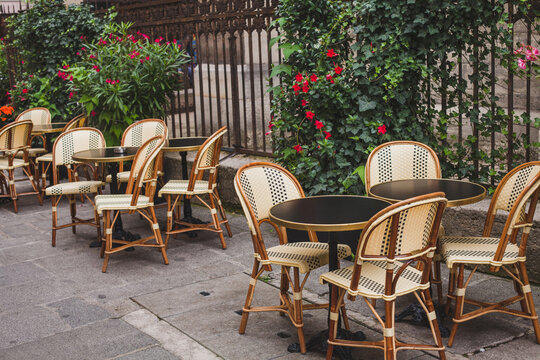 Fototapeta cozy cafe in Paris in summer on terrace, France