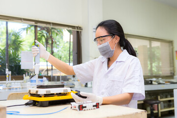 Work in quality inspection laboratory . Omicron testing process,omicron strain of the coronavirus....