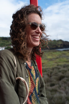 Laughing happy with the wind in the hair