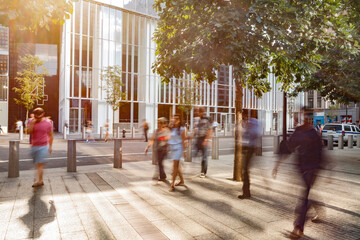 blurred people moving