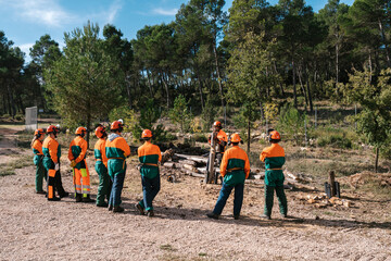 Group of lumberjacks listening to headman
