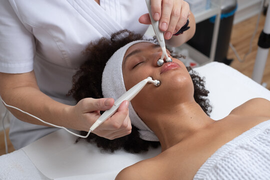 Woman Having A Facial Treatment By The Skin Care Expert