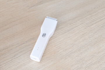 white clipper on wood background.