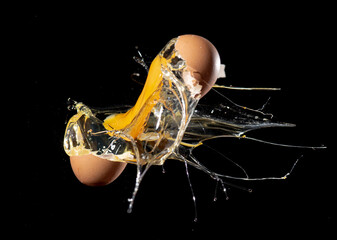 explosion of egg,exploding of egg on black background