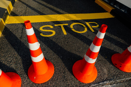 yellow stop line on the road