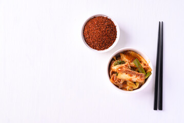 Kimchi cabbage on white background, Korean homemade fermented side dish food, Top view