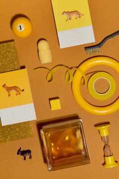 Yellow set with doll, billiard ball, toy animals, etc.