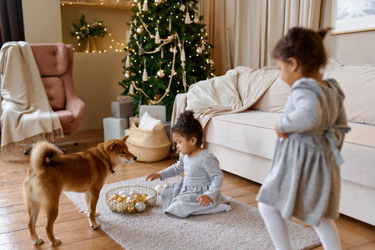 children play with New Year's gifts