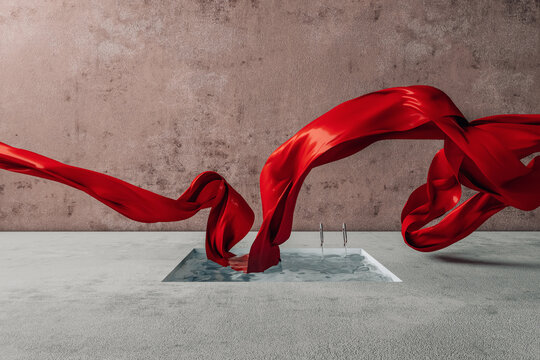 Red fabric flying over a pool