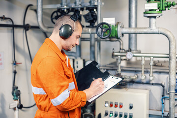 Ship officer doing inspection with checklist