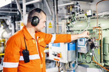 engineer inspects fuel equipment