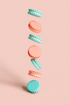 Cookies falling/ suspended on a pink background